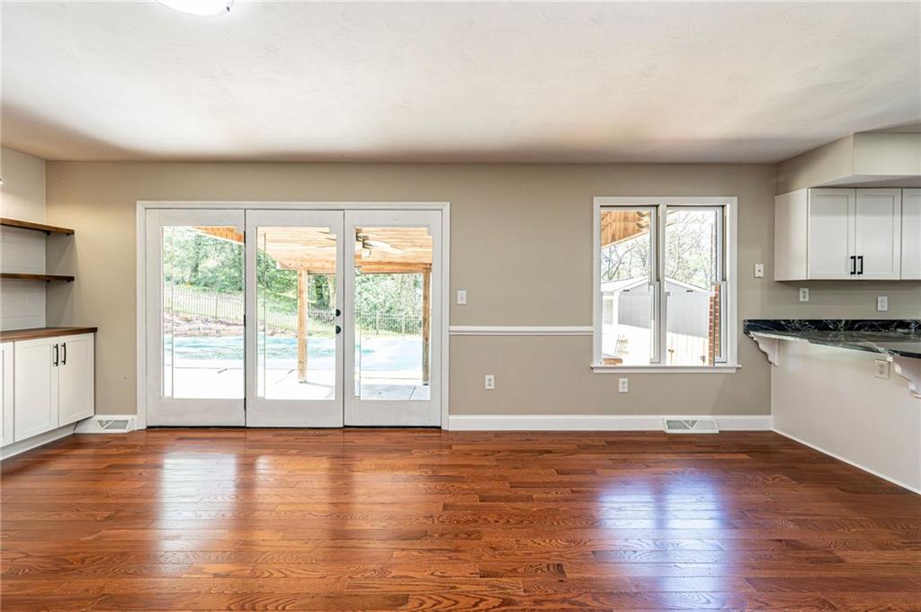 1120 Sandstone Road Greensburg, PA 15601 - Photo 19 of 43 a view of empty room with wooden floor and fan