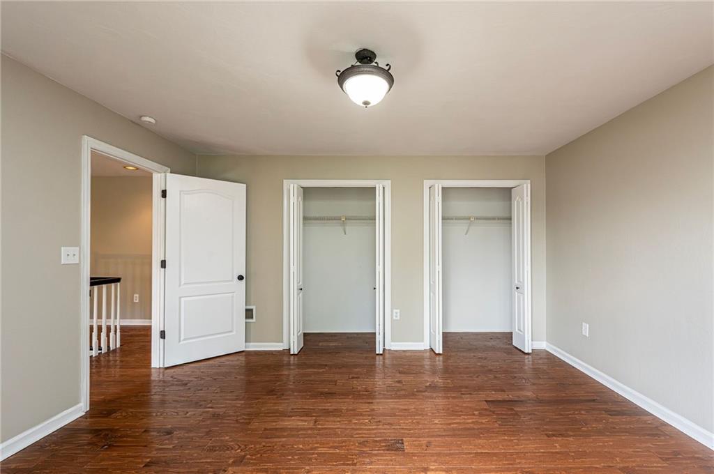 1120 Sandstone Road Greensburg, PA 15601 - Photo 28 of 43 a view of an empty room and wooden floor