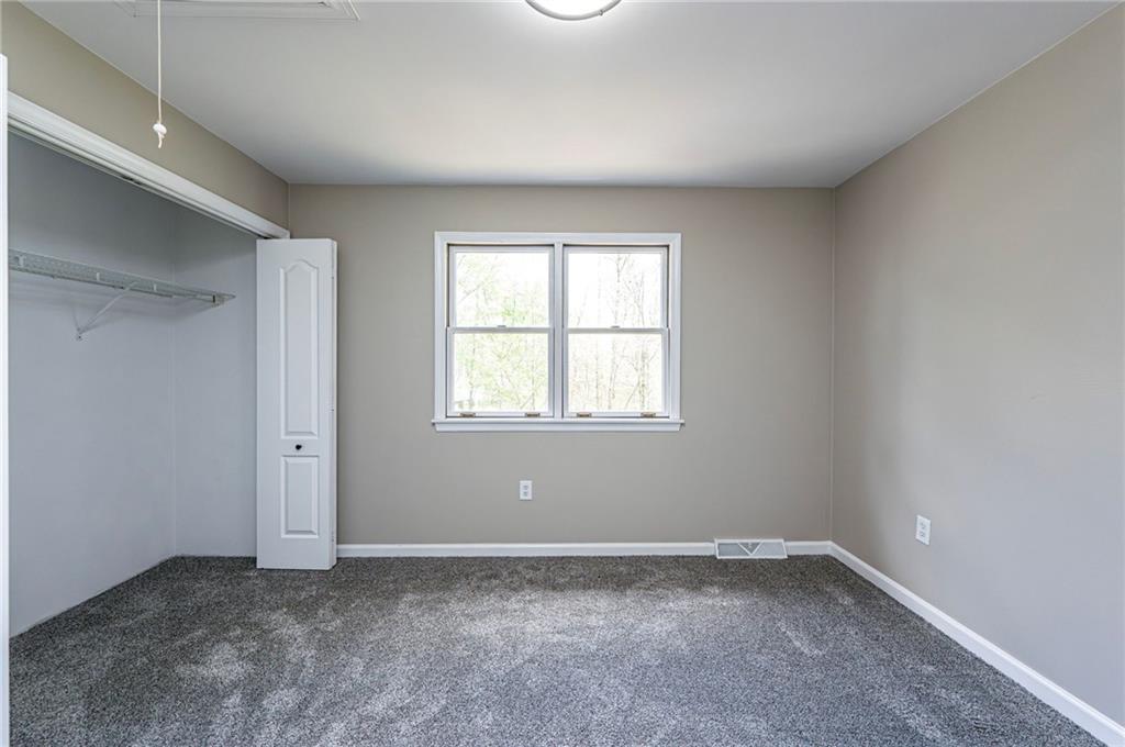 1120 Sandstone Road Greensburg, PA 15601 - Photo 34 of 43 an empty room with a window
