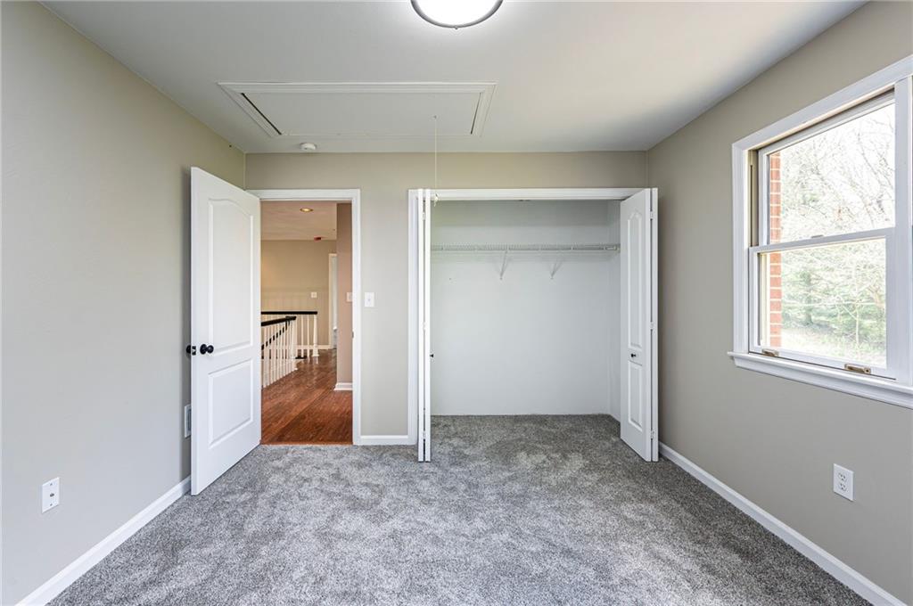 1120 Sandstone Road Greensburg, PA 15601 - Photo 35 of 43 an empty room with windows and closet