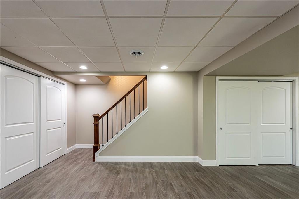 1120 Sandstone Road Greensburg, PA 15601 - Photo 36 of 43 a view of an empty room with wooden floor