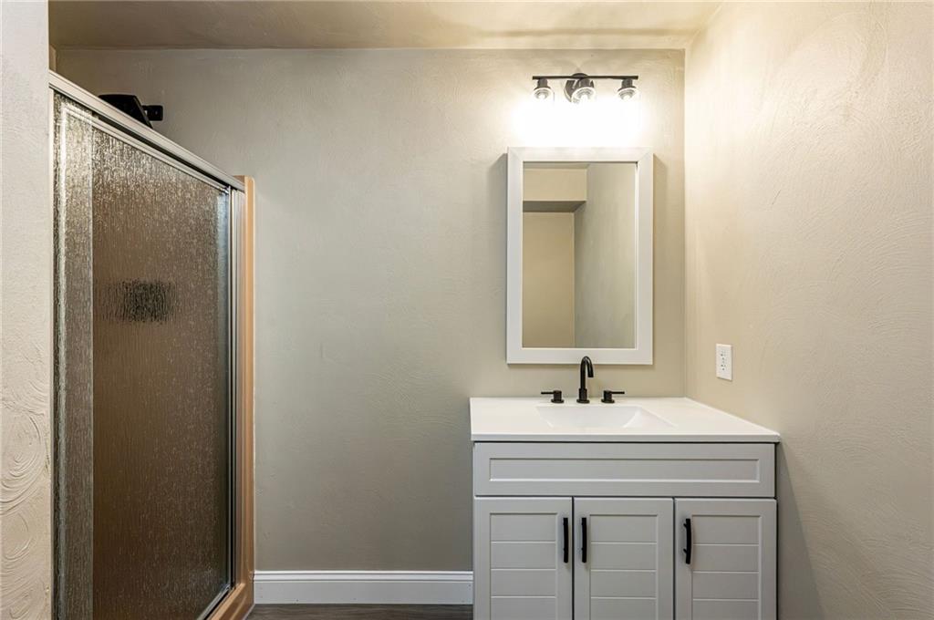 1120 Sandstone Road Greensburg, PA 15601 - Photo 41 of 43 a bathroom with a sink and a mirror