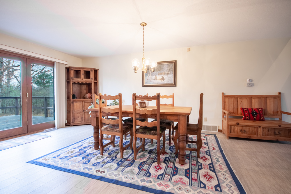 19707 State Line Road Harvard, IL 60033 - Photo 14 of 23 a dining room with furniture and wooden floor
