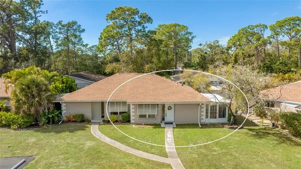 a view of a house with a swimming pool
