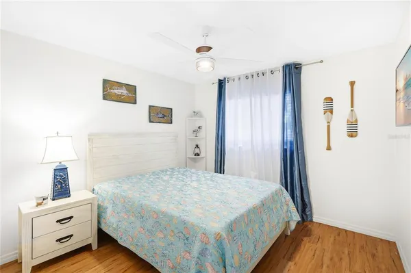 a bedroom with a bed and a cabinets