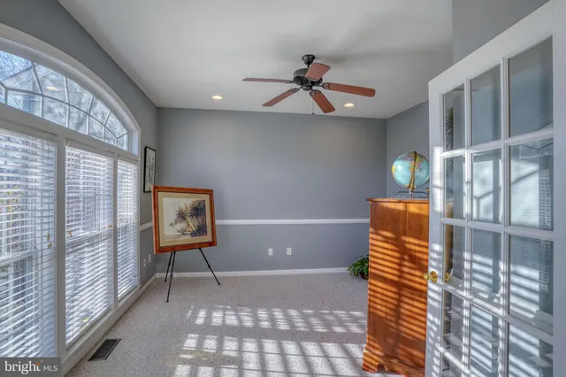 a view of entryway with a front door
