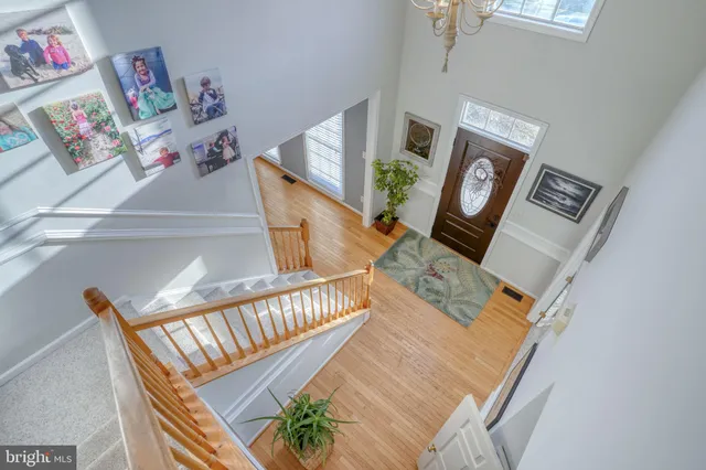 a bathroom with a granite countertop bathtub shower sink and mirror