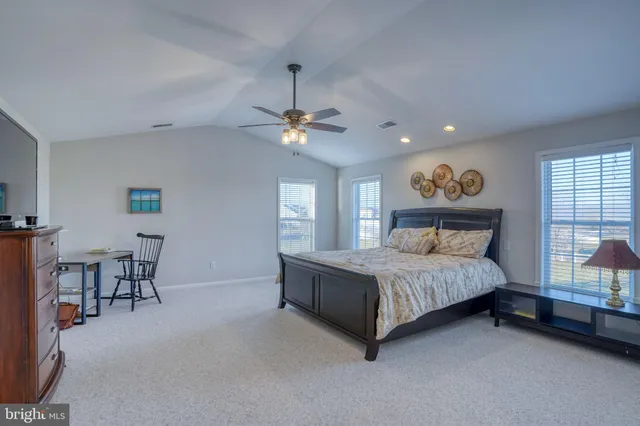 a bathroom with double vanity sink and a mirror