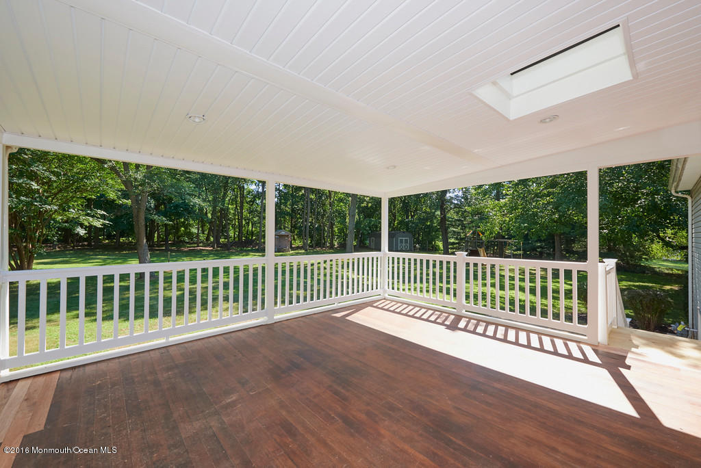 34 Farm Road Middletown, NJ 07748 - Photo 19 of 24 34 Farm Covered Rear Deck