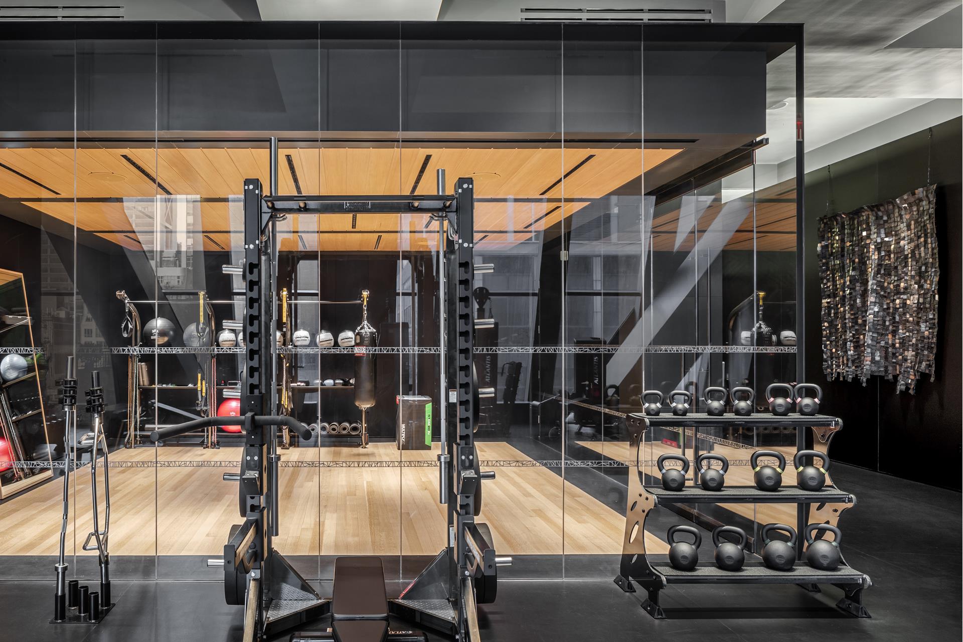 53 West 53rd Street, Unit 72B Manhattan, NY 10019 - Photo 20 of 39 a room with gym equipment