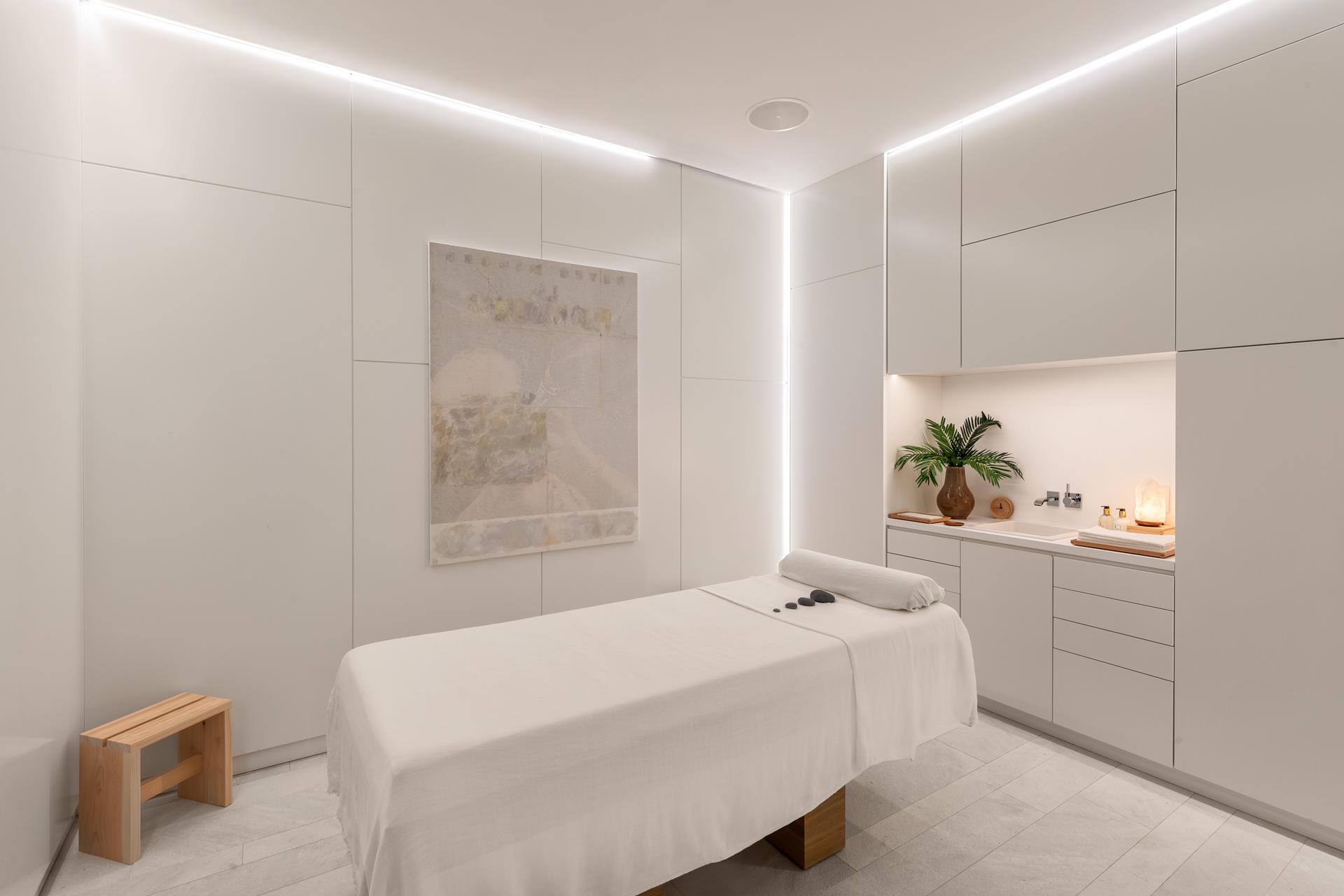 53 West 53rd Street, Unit 72B Manhattan, NY 10019 - Photo 25 of 39 a bedroom with a bed and a window