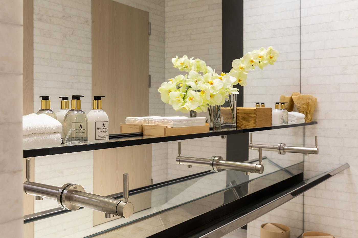 53 West 53rd Street, Unit 72B Manhattan, NY 10019 - Photo 27 of 39 a kitchen with a sink and a potted plant on the counter