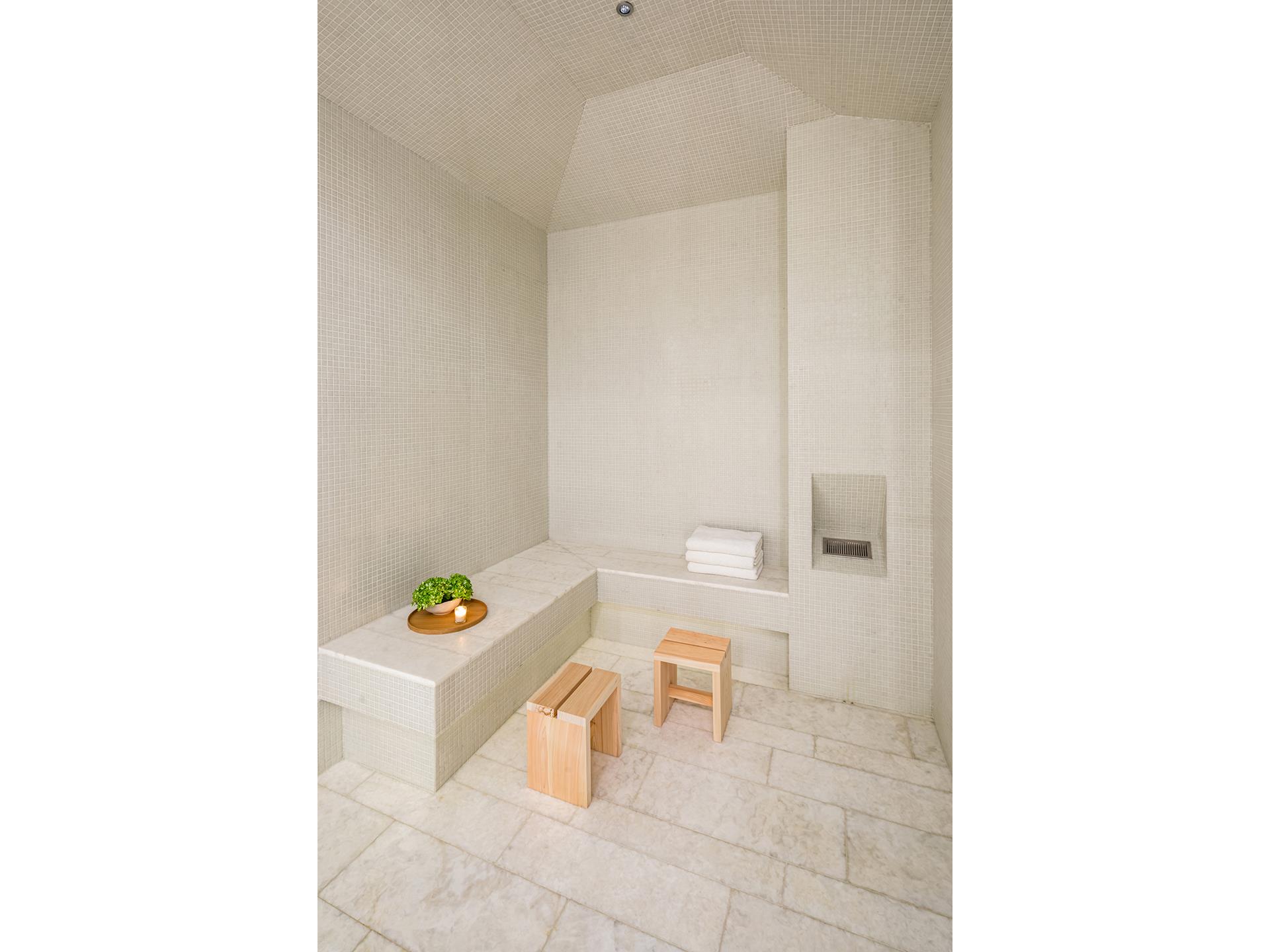 53 West 53rd Street, Unit 72B Manhattan, NY 10019 - Photo 28 of 39 a bathroom with a toilet and a shower