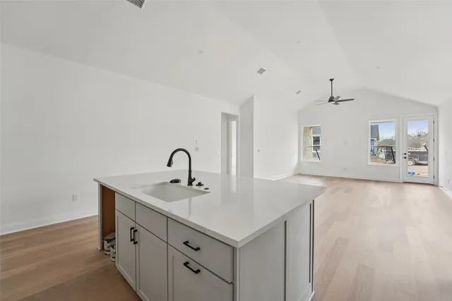 a view of an empty room and a window