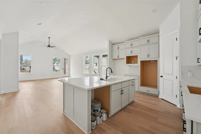 a view of an empty room and a window