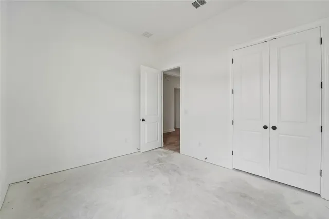 a bathroom with a sink a toilet and a shower