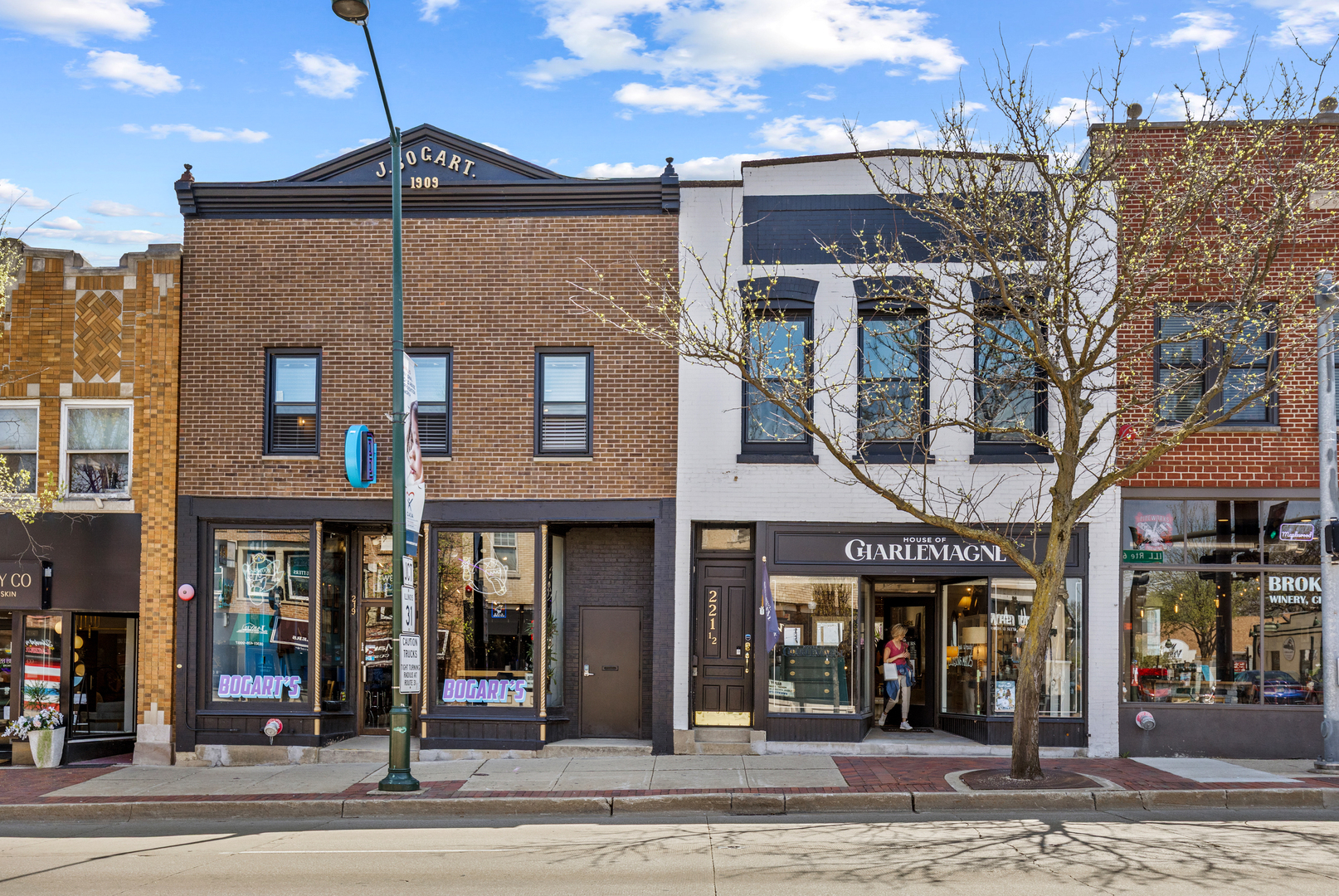 a front view of a building and a people
