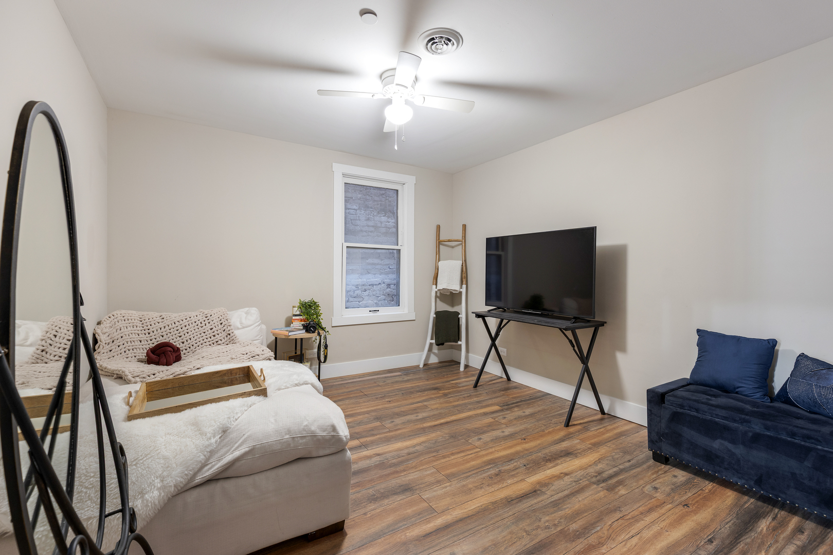 219 West Main Street St. Charles, IL 60174 - Photo 14 of 30 a living room with furniture and a flat screen tv