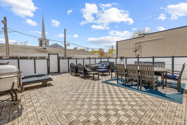 a outdoor space with lots of chairs