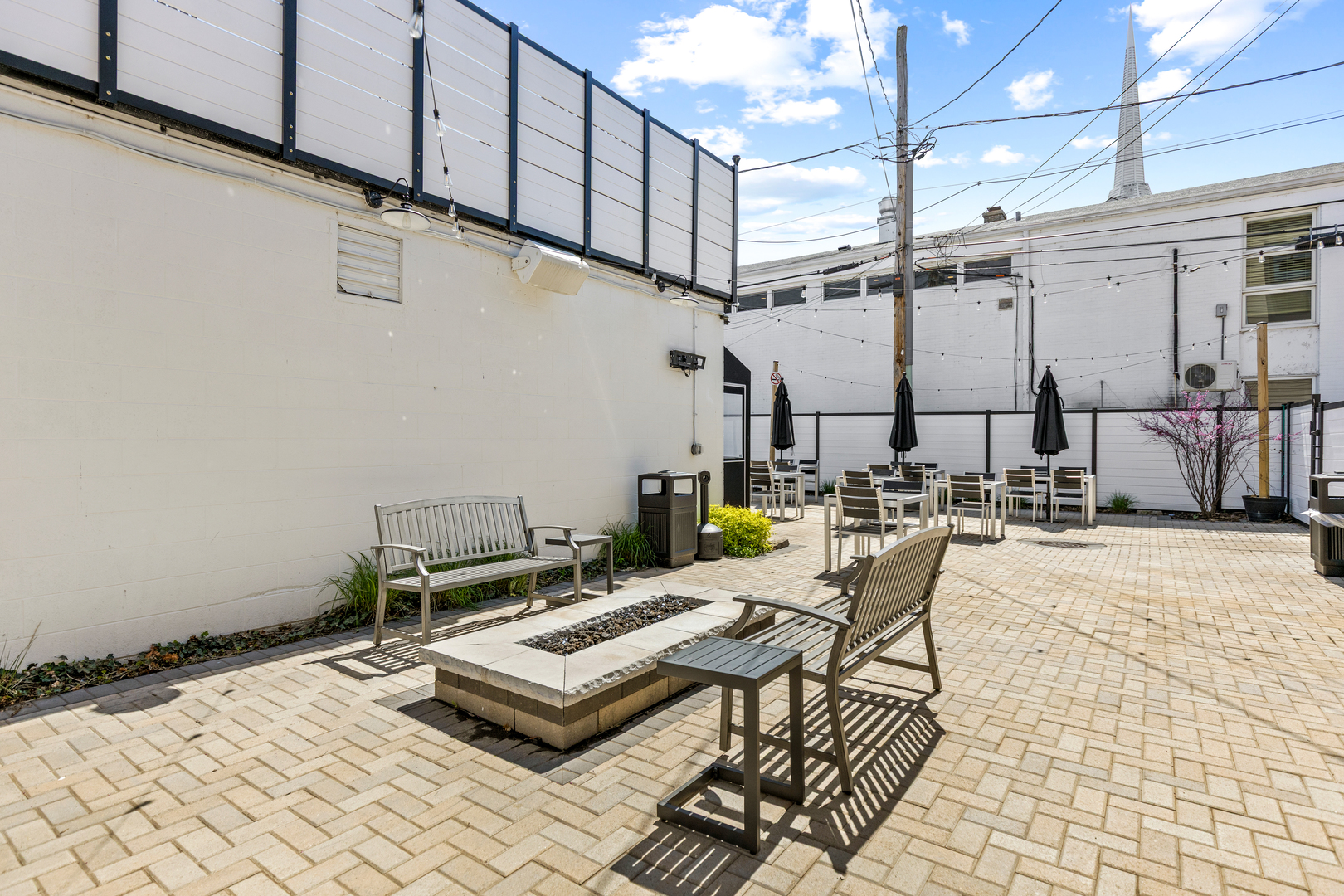 219 West Main Street St. Charles, IL 60174 - Photo 29 of 30 a view of a patio with a table and chairs