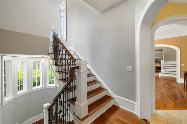 a view of entryway with wooden floor and door