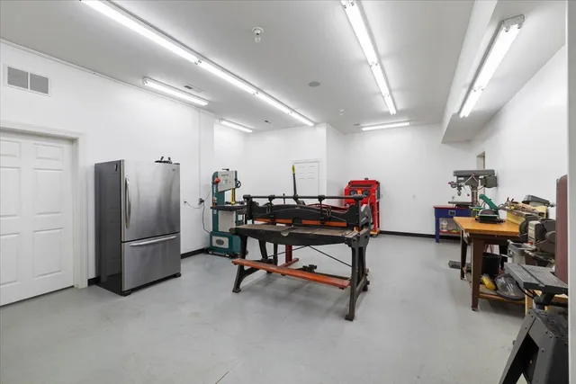 a view of a room with gym equipment