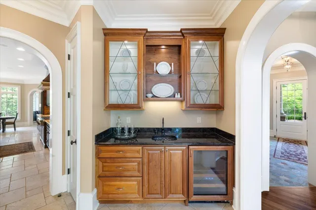 a bedroom with a bed closet and a window