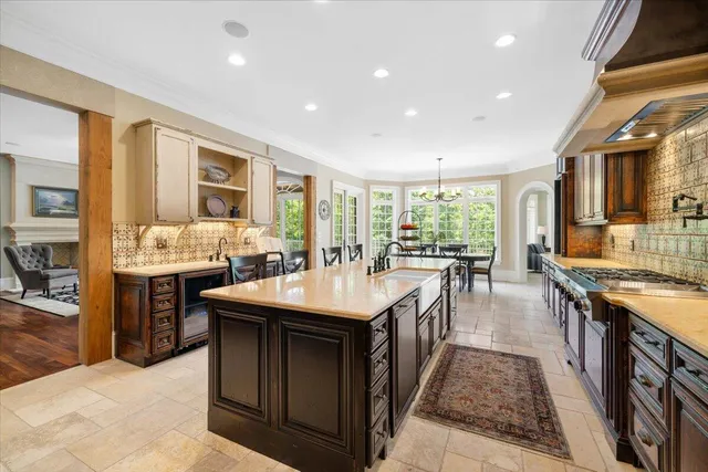 a view of a dining room with furniture large windows and wooden floor