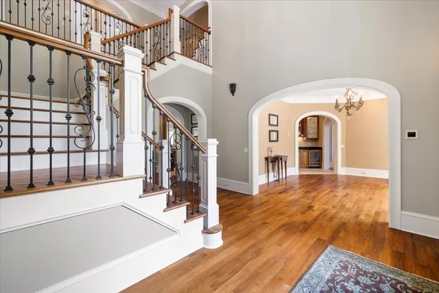 an aerial view of a house with garden space and street view
