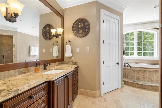 a view of a backyard with a garden and entertaining space