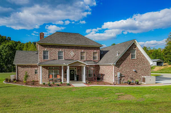 a bathroom with a shower and a sink