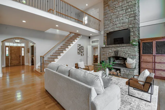 a view of hallway with wooden floor