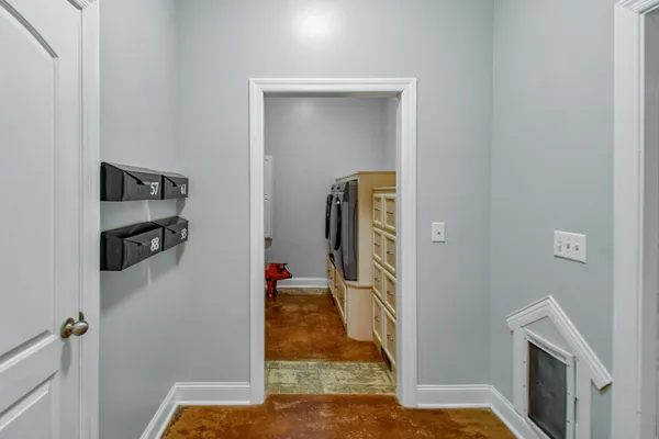 a view of a house with backyard sitting area and garden