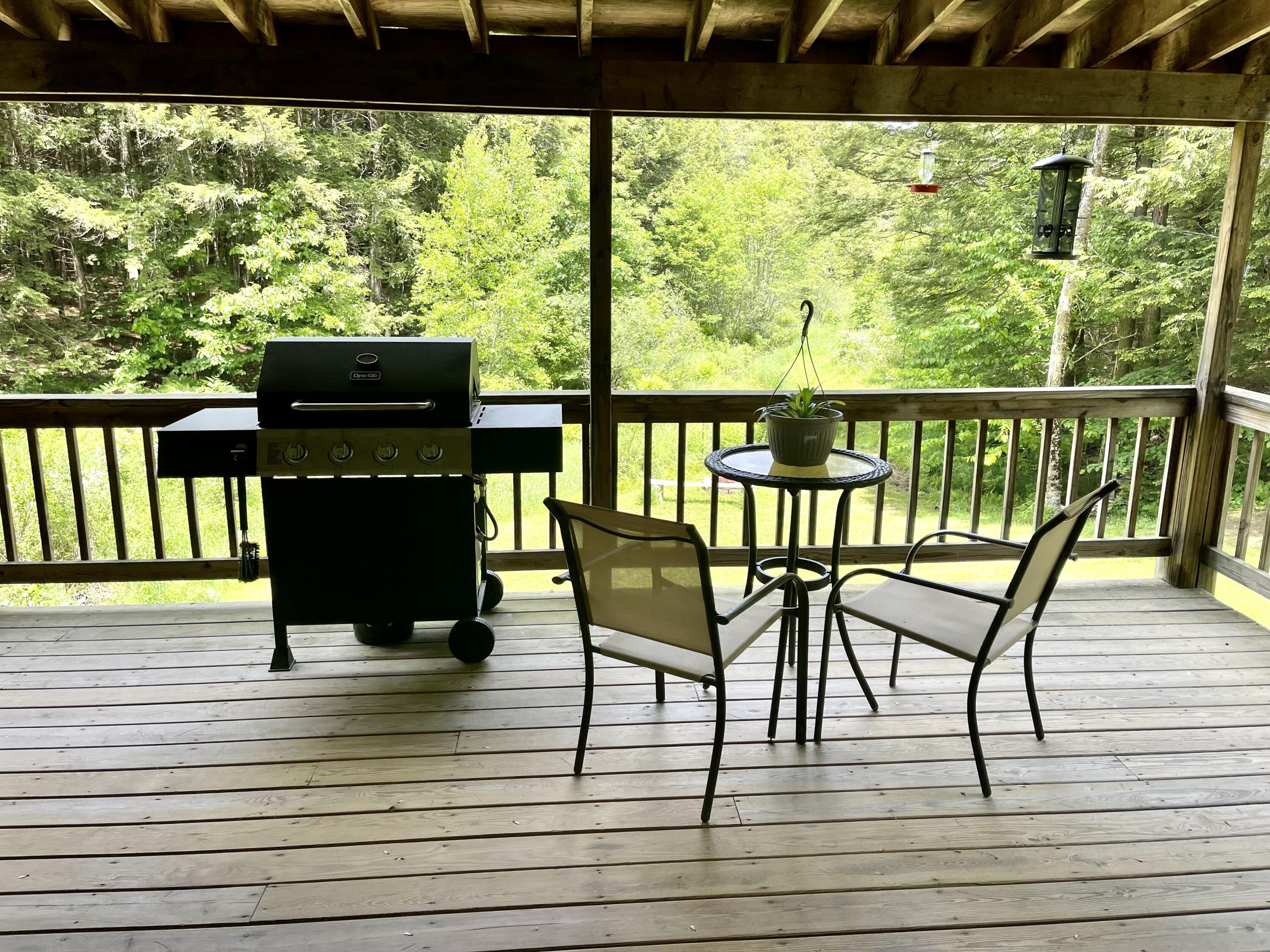 36 Pine Point Road Oxford, ME 04270 - Photo 13 of 37 12x36 farmer's porch off living room