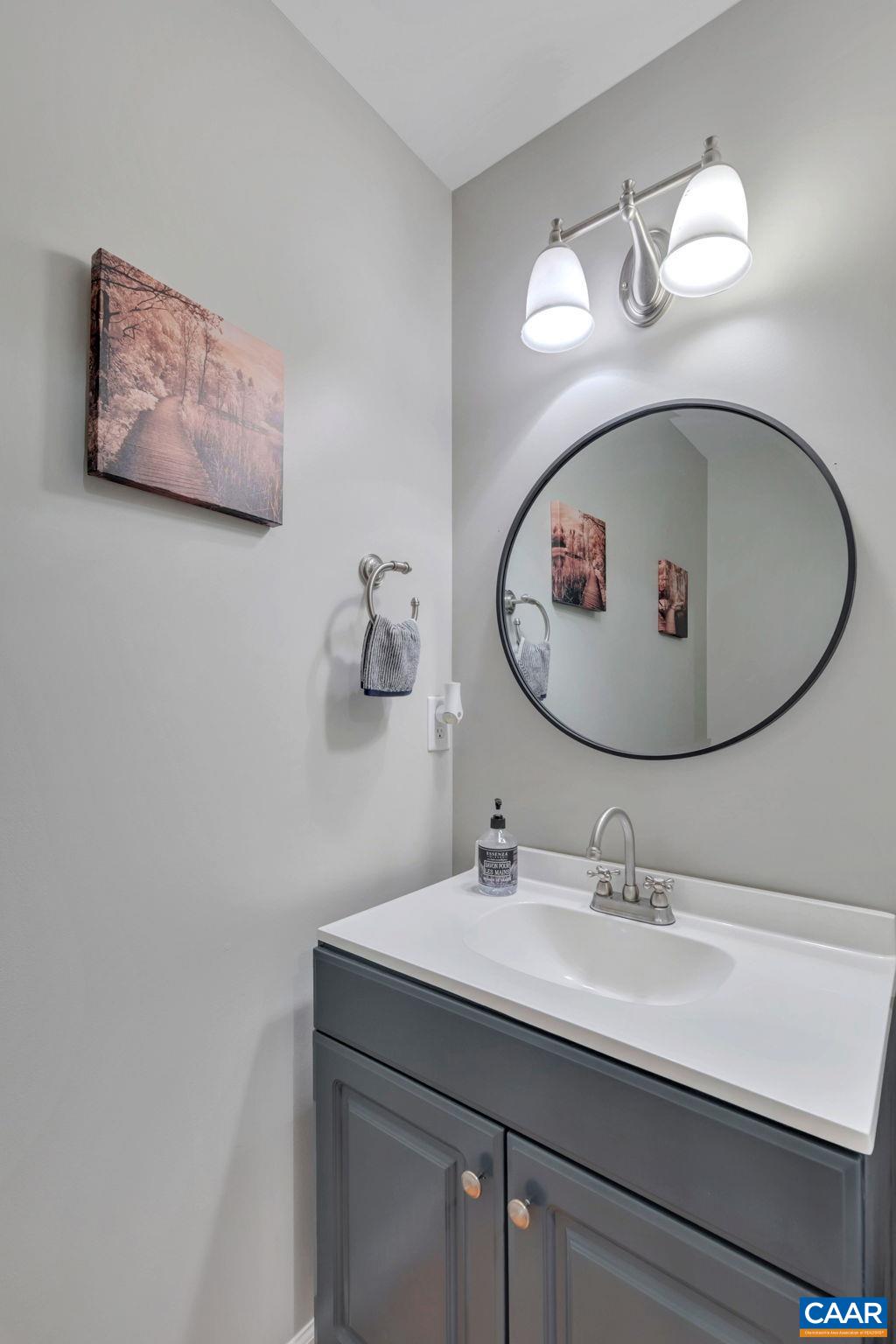 57 Amethyst Road Palmyra, VA 22963 - Photo 15 of 36 a bathroom with a sink and mirror