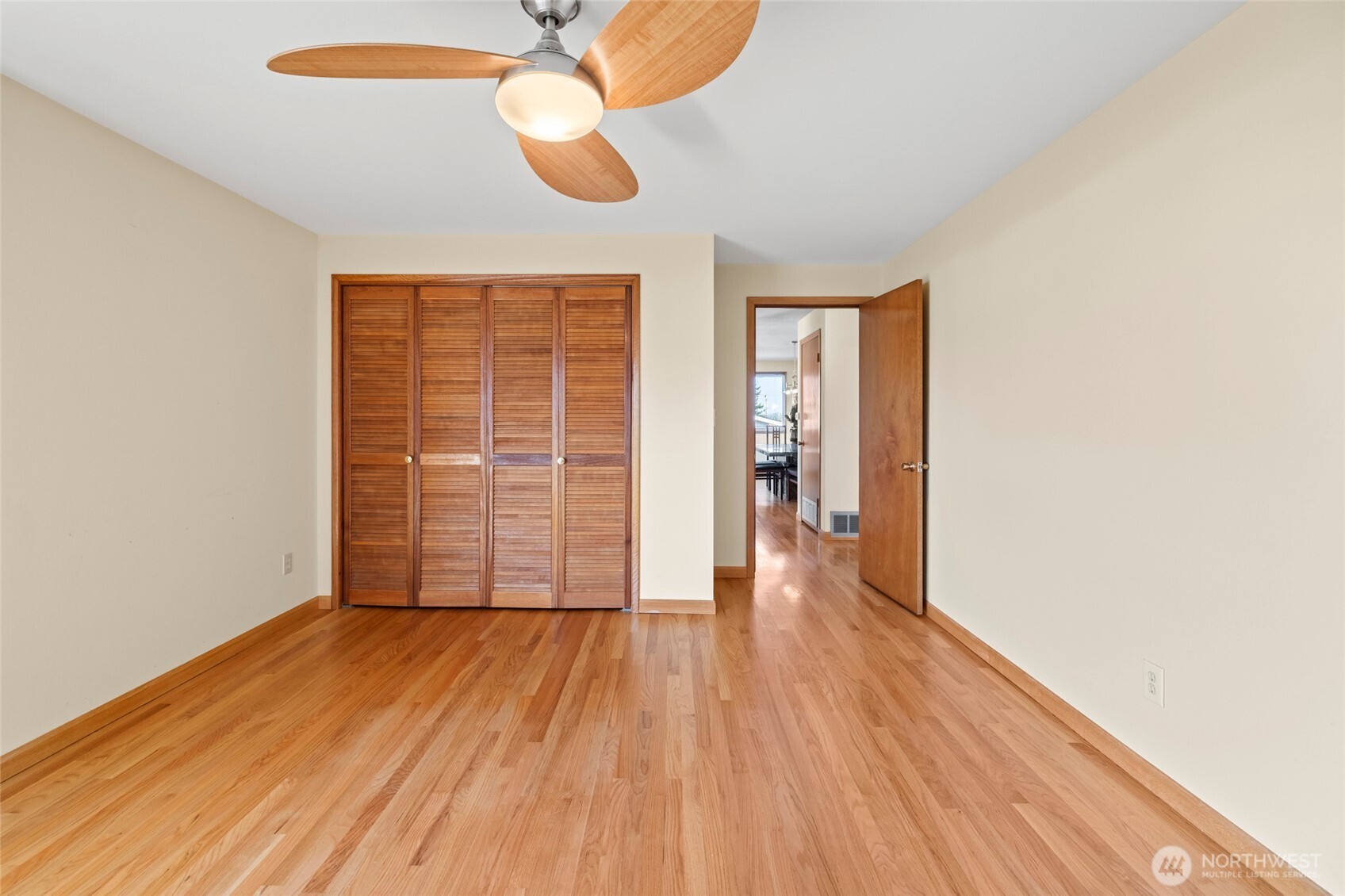 1307 26th Street Anacortes, WA 98221 - Photo 23 of 40 wooden floor in an empty room with a window