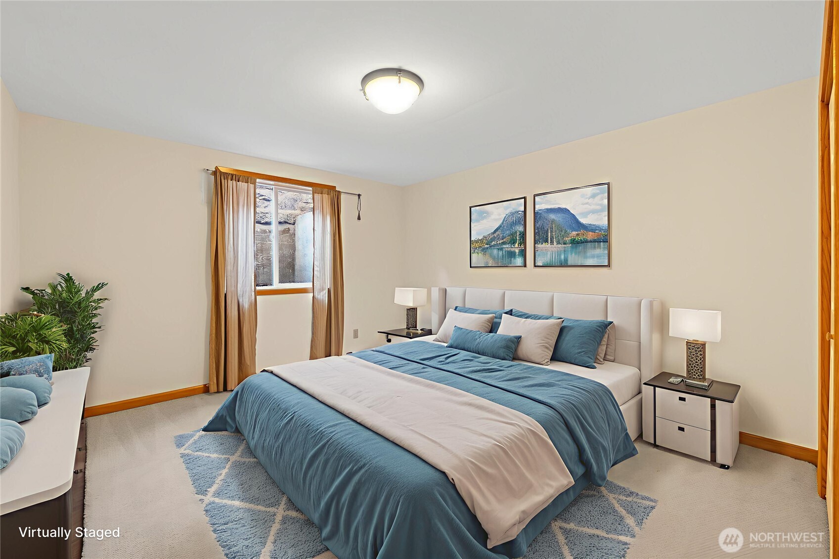 1307 26th Street Anacortes, WA 98221 - Photo 25 of 40 a bedroom with a bed and a painting on the wall