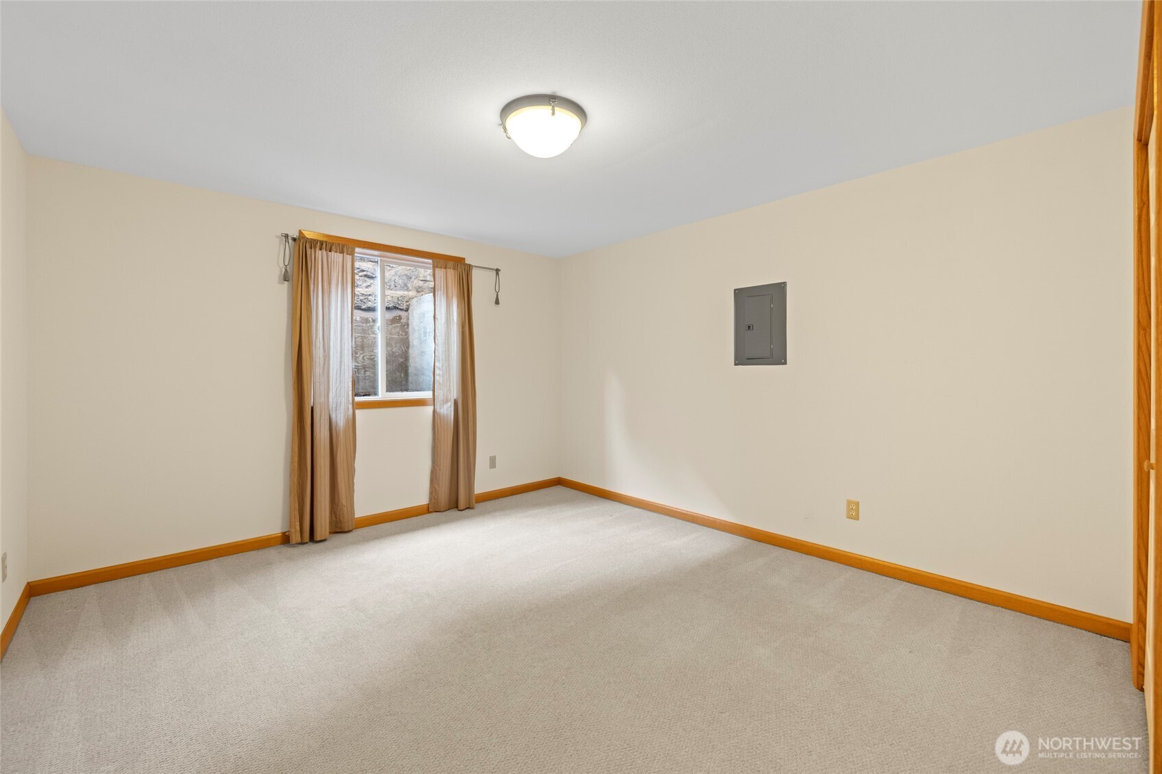 1307 26th Street Anacortes, WA 98221 - Photo 26 of 40 a view of an empty room with a window