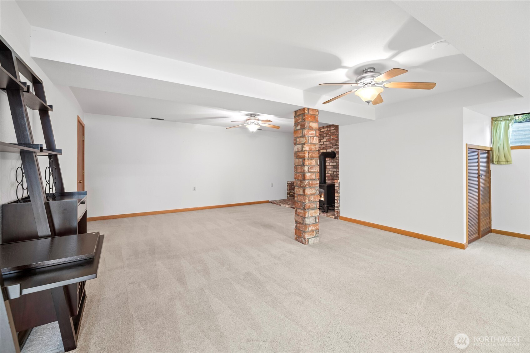 1307 26th Street Anacortes, WA 98221 - Photo 30 of 40 a view of an empty room with a window
