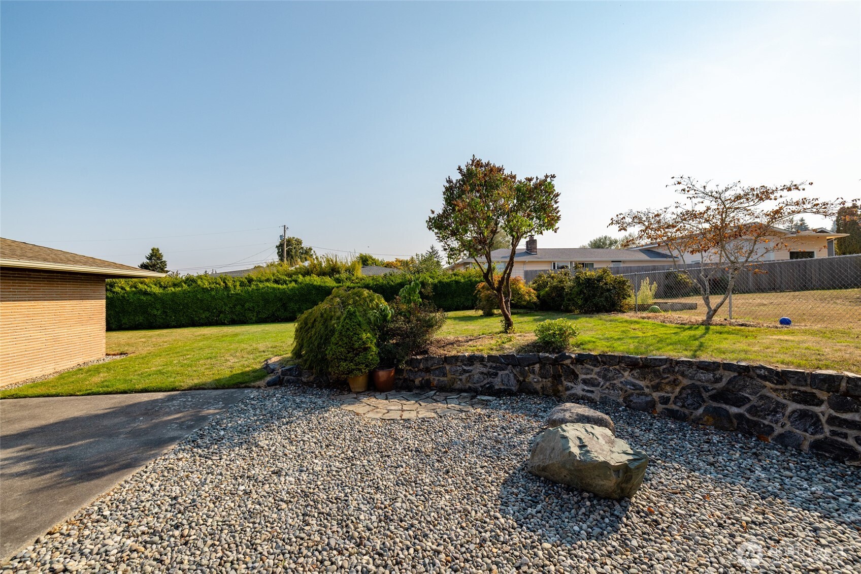 1307 26th Street Anacortes, WA 98221 - Photo 37 of 40 a view of a swimming pool and a yard