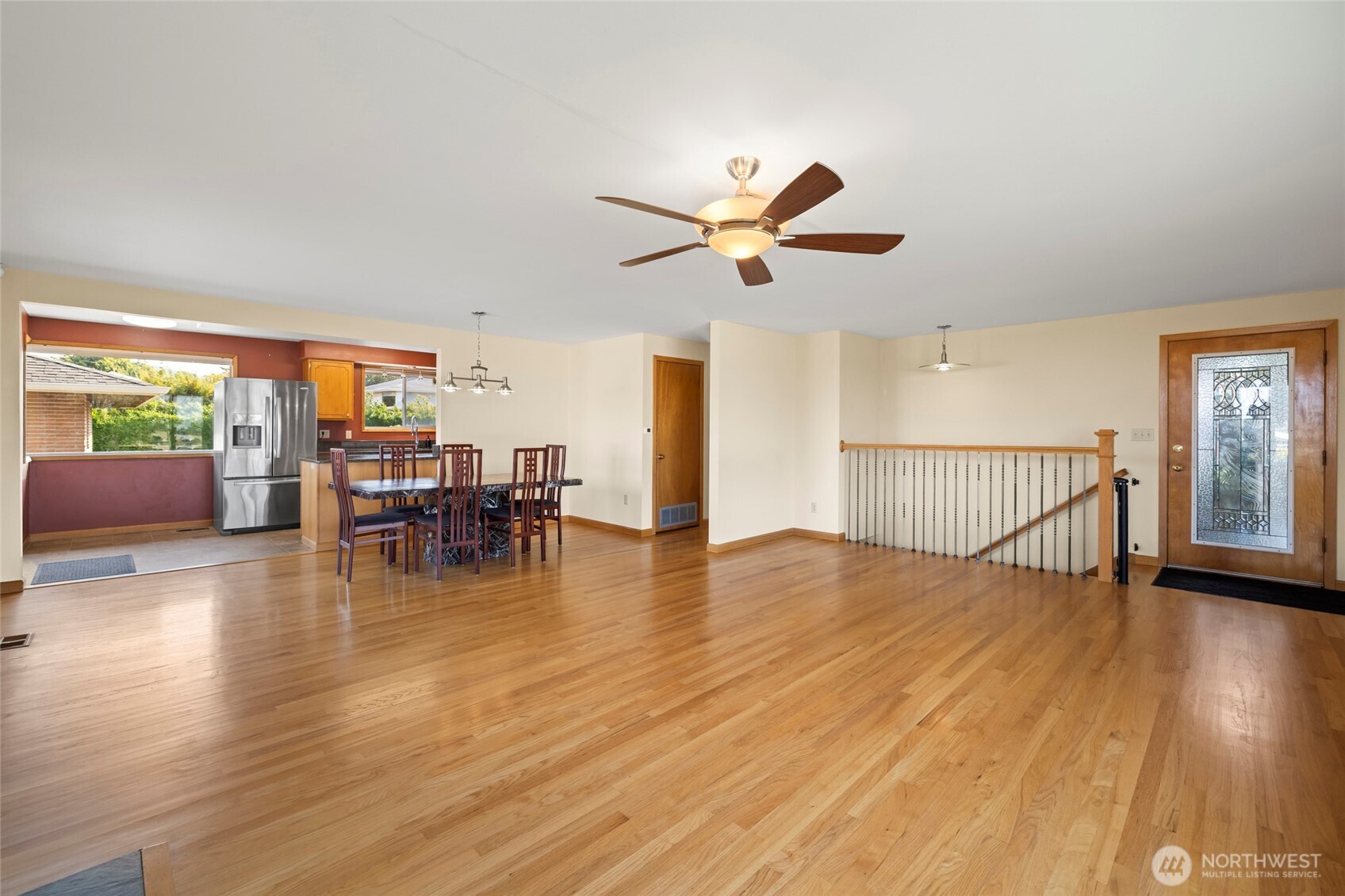 1307 26th Street Anacortes, WA 98221 - Photo 9 of 40 a view of a livingroom with furniture wooden floor and a ceiling fan