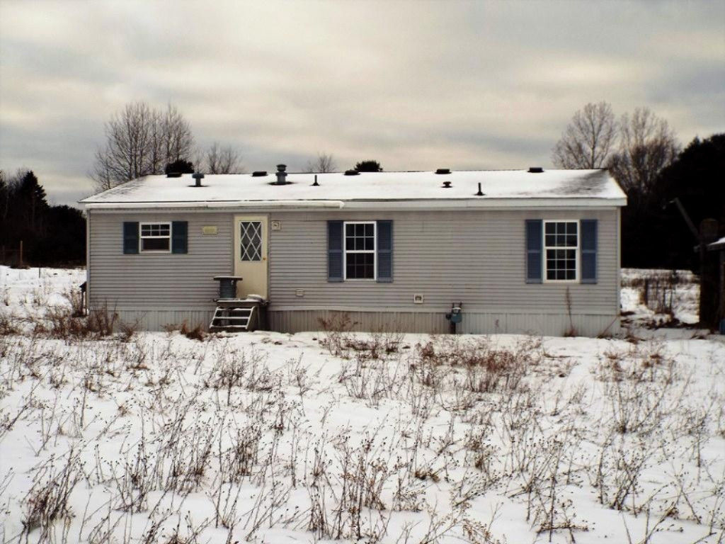 9441 Bailey Road Howard City, MI 49329 - Photo 1 of 13 Front of Home
