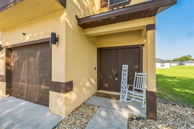 a view of a entryway door front of house