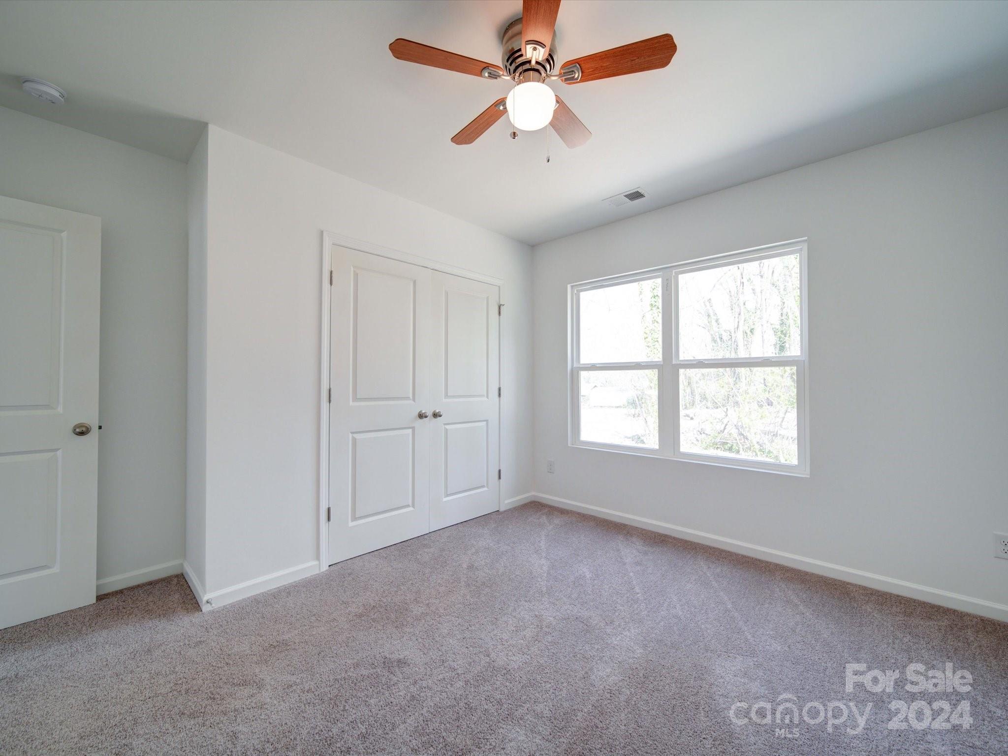 147 Lambeth Road Thomasville, NC 27360 - Photo 24 of 33 a view of an empty room with a window