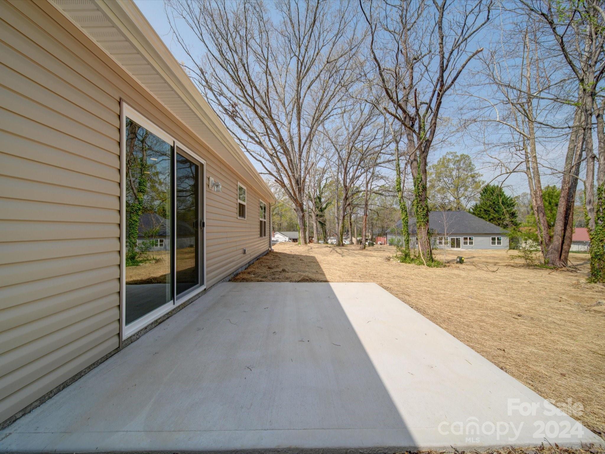147 Lambeth Road Thomasville, NC 27360 - Photo 30 of 33 a view of road with large trees