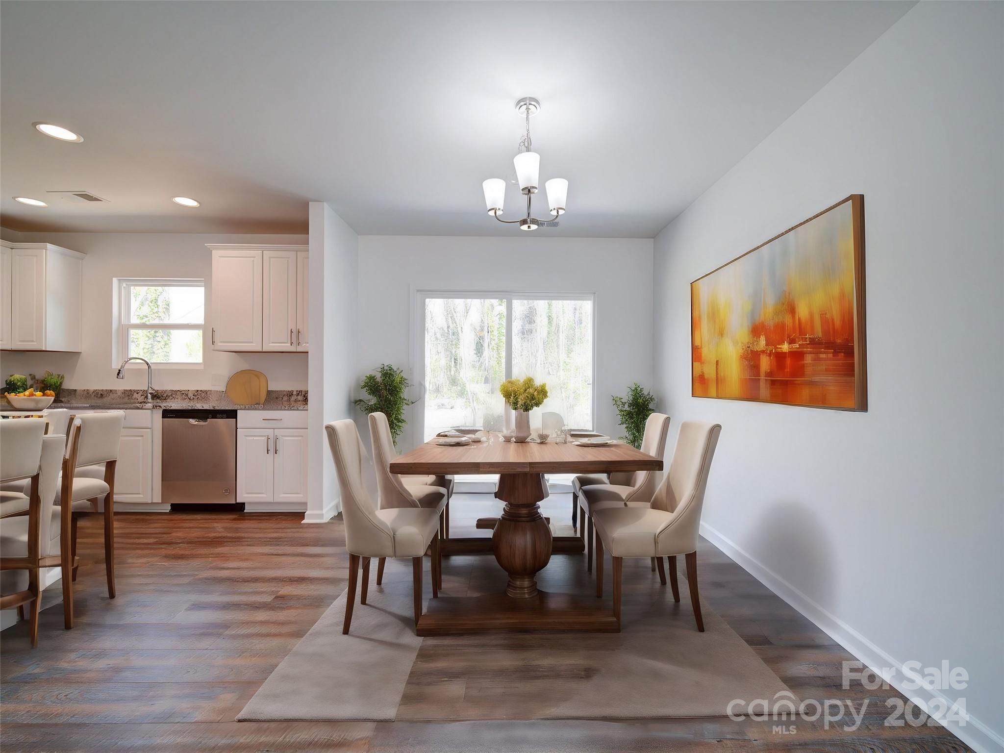 147 Lambeth Road Thomasville, NC 27360 - Photo 6 of 33 a view of a dining room with furniture window and wooden floor