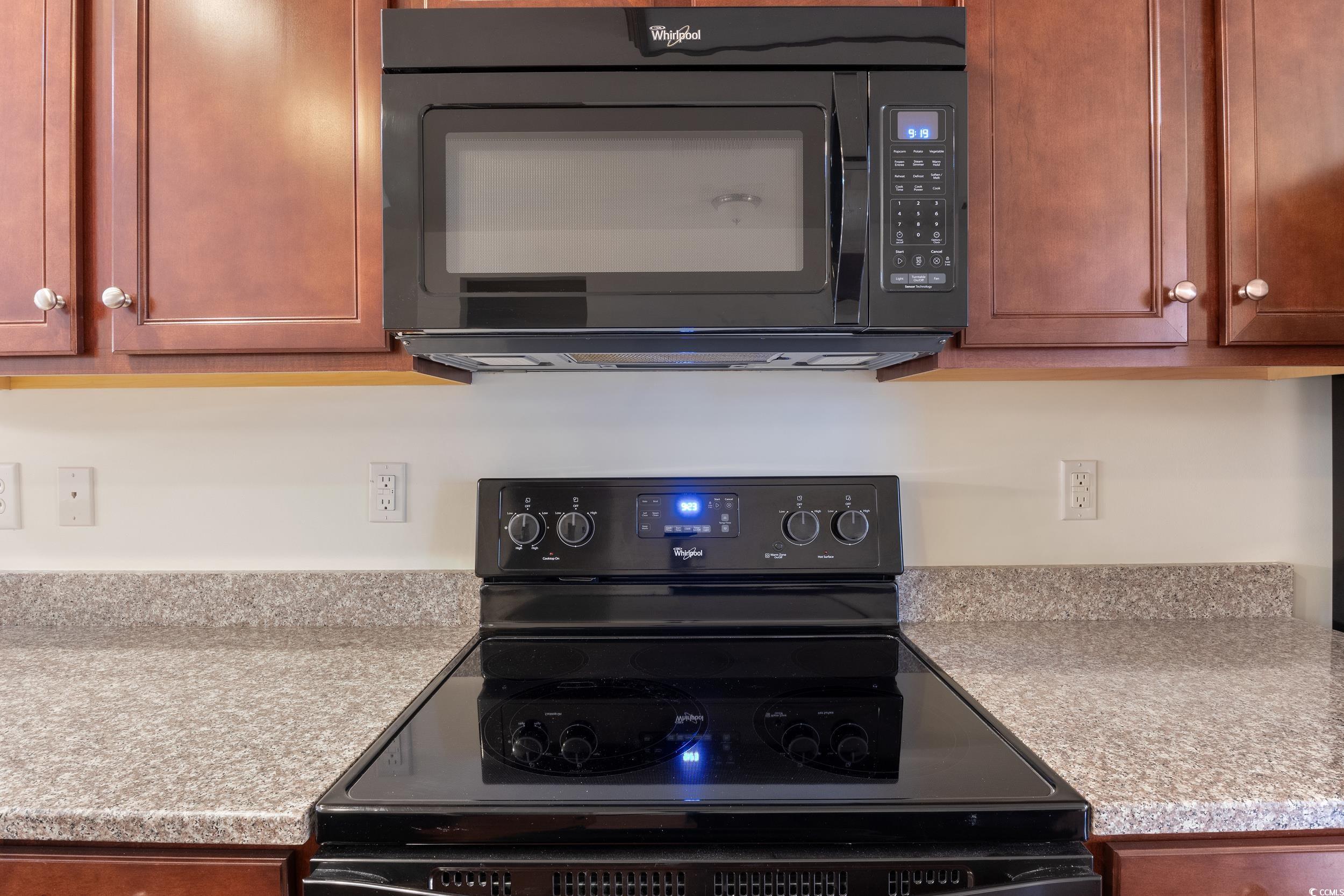 1517 Palmina Loop, Unit B Myrtle Beach, SC 29588 - Photo 14 of 30 Kitchen featuring black appliances and brown cabin