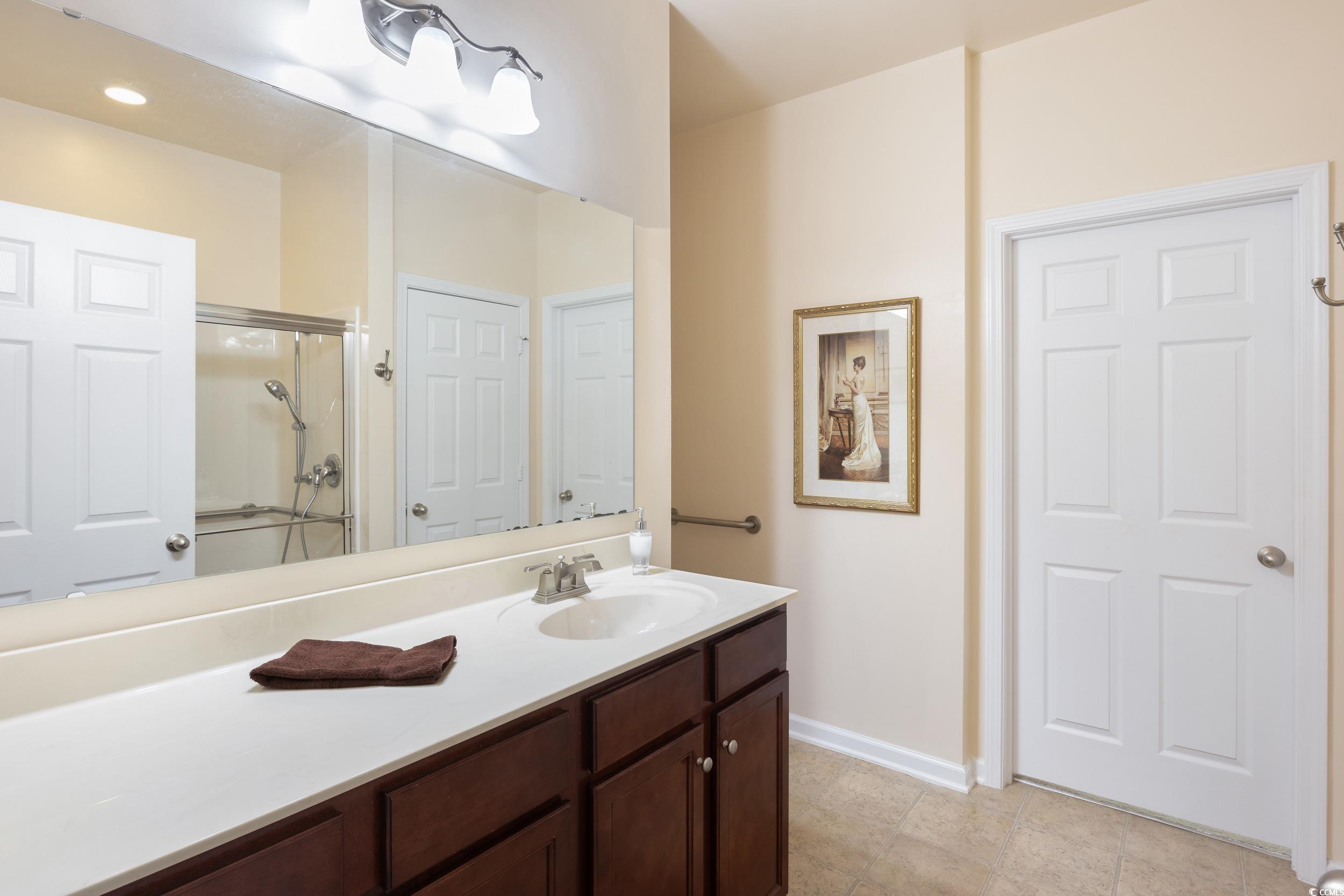 1517 Palmina Loop, Unit B Myrtle Beach, SC 29588 - Photo 22 of 30 Full bathroom with oversized walk in shower, vanit