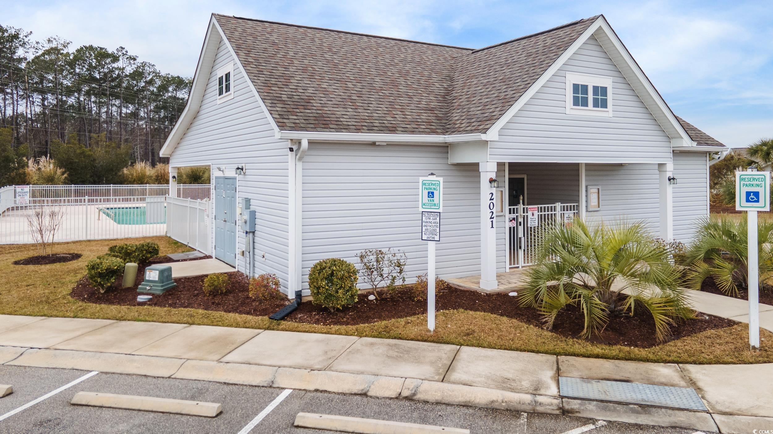 1517 Palmina Loop, Unit B Myrtle Beach, SC 29588 - Photo 29 of 30 View of front of property featuring fence, a fence