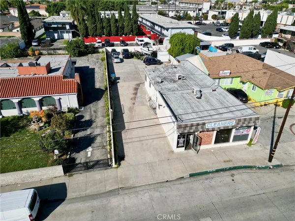 an aerial view of house with yard